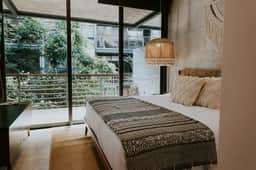 Luxe 2BR Boho Condo Tulum | Pool | Gym | Coworking
