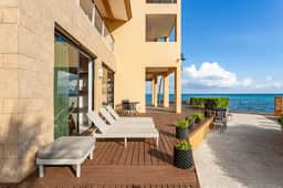 Stunning Beachfront 3BR Condo | Private Pool | Gym