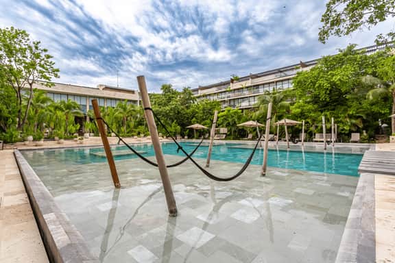 Modern 2BR Playacar | Huge Pool | Gym | Free Bikes